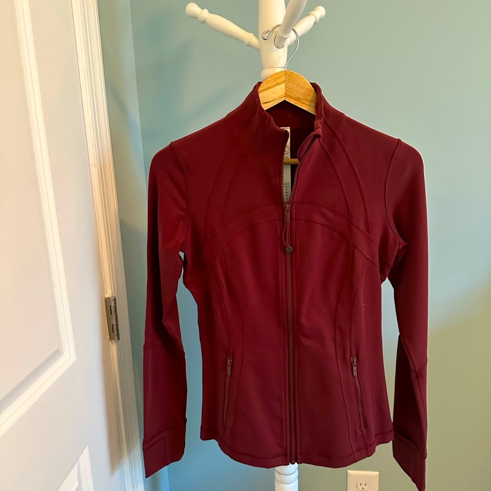 Lululemon size small dynamic define jacket never been worn color Pomegranate.